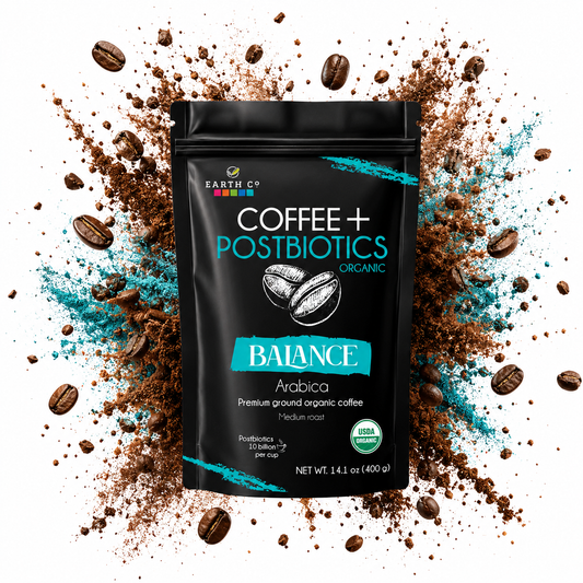 Earth Co Balance organic postbiotic coffee, front of USDA Organic ground coffee bag on a burst of coffee grounds and beans